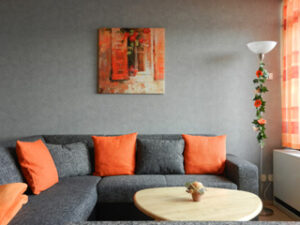 Fehmarn Wohnung Grande Bequeme Couch mit Blick auf die Ostsee